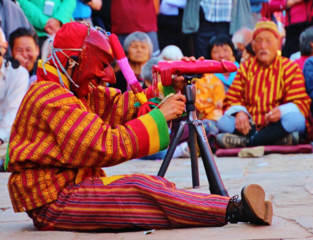 Services atsara at the jampa lhakhang tshechu jakar bumthang valley 3